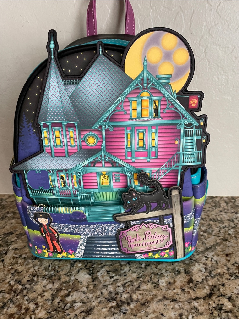 Loungefly CORALINE Haunted House Backpack - Pink & Teal